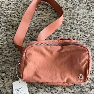 Brand new lulu lemon everywhere belt bag Savannah pink color